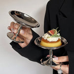 support dessert argenté élégant détails sculptés classique fruits légumes photo accessoire