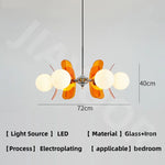 suspension lumineuse moderne sphères translucides métal doré salon chambre salle manger