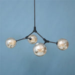 suspension lumineuse moderne scandinave noir sphères translucides ampoules led branchettes structure métallique