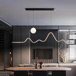 suspension lumineuse moderne ondulée globe lunaire noir blanc beige