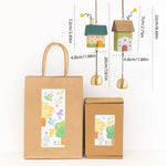 mobiles décoratifs bois fleurs oiseaux nuages cloches cordelettes moderne vert beige doré GOOD LUCK