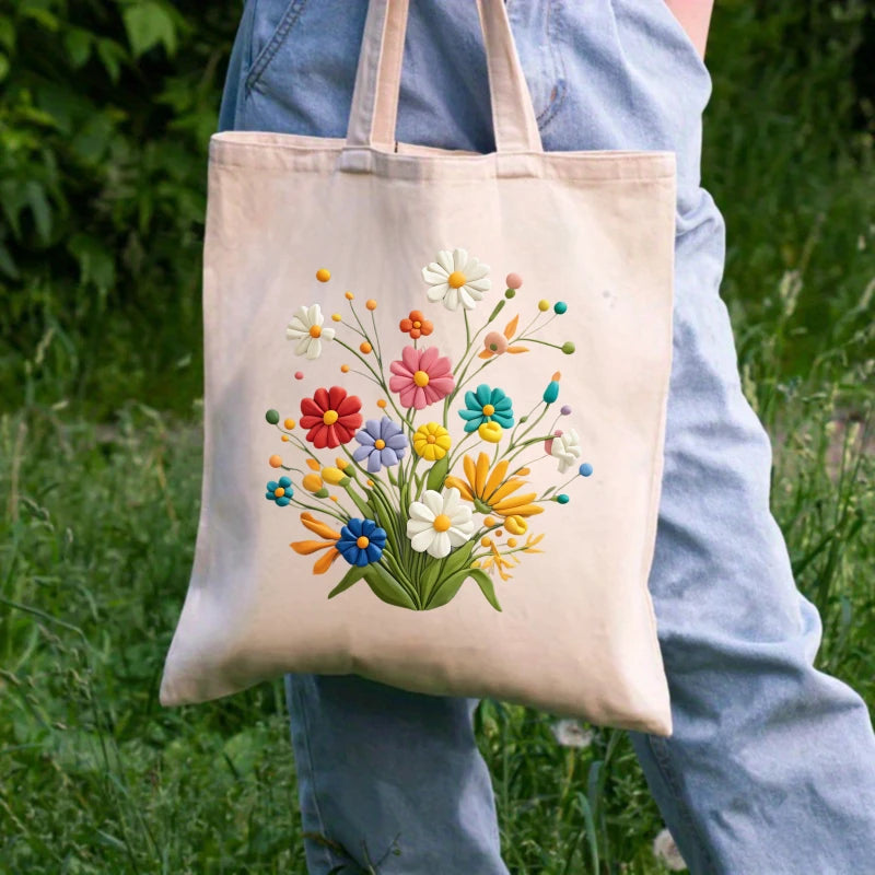 sac main toile fleurs colorées beige respectueux environnement réutilisable poignées tissu motifs imprimés multi