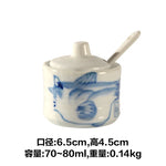 pot condiments porcelaine broyeur épices cuillère fleurs blanches motifs floraux rustique