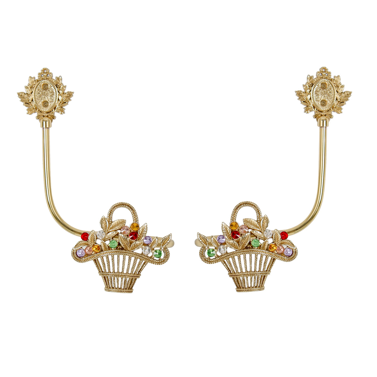 Deux élégantes barrettes à cheveux dorées ornées de corolle de fleurs multicolores et de feuilles dorées, disposées de part et d'autre d'un espace blanc.