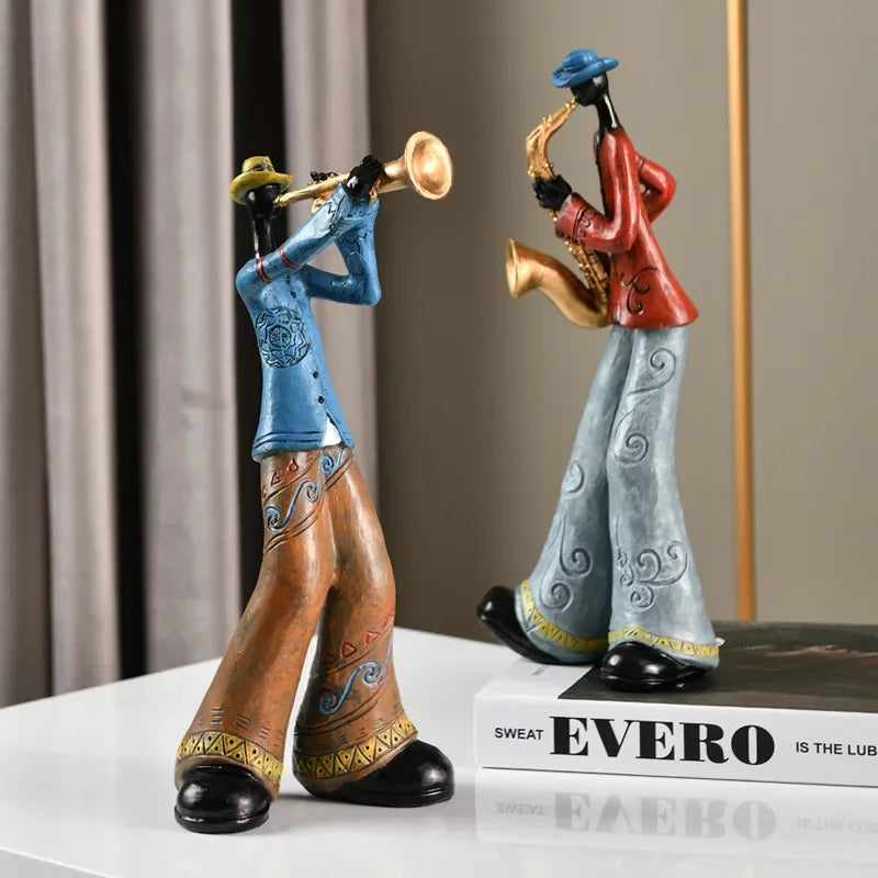 statues musiciens résine trompette saxophone chanteur clavier violoncelle ethnique artisanal décoration maison salon