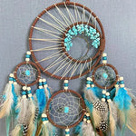 décoration intérieure attrape rêves boho plumes fil coton tressé marron bleu blanc gris