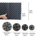 grille drainage plante noir moderne perforations circulaires différentes tailles incluses
