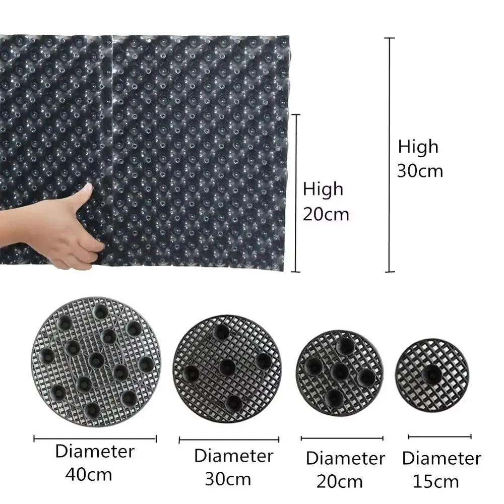 grille drainage plante noir moderne perforations circulaires différentes tailles incluses