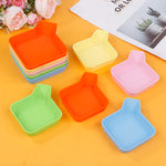 organisateur rangement boîtes carrées orange vert bleu rose jaune moderne minimaliste jeux société accessoires
