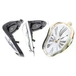 horloges murales surréalistes dali or noir argent chiffres romains aiguilles forme organique transparentes salon