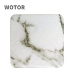 Texture de marbre blanc et gris avec des veines abstraites sur la surface.