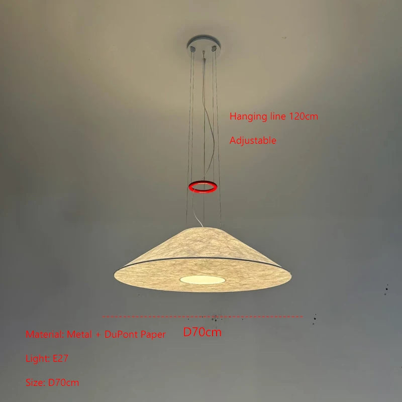 suspension lumineuse moderne minimaliste beige clair abatjour opaque câbles métalliques rouge salon chambre