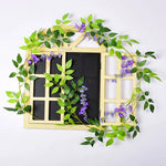guirlande végétale naturelle fleurs vertes violettes blanches roses extérieur décoration maison jardin mariage festivités