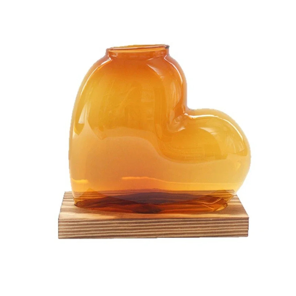 vase verre forme cœur transparent moderne plante verte support bois