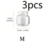 vases transparents modernes rayures verticales poignée métallique décoration intérieure table centrale pièces