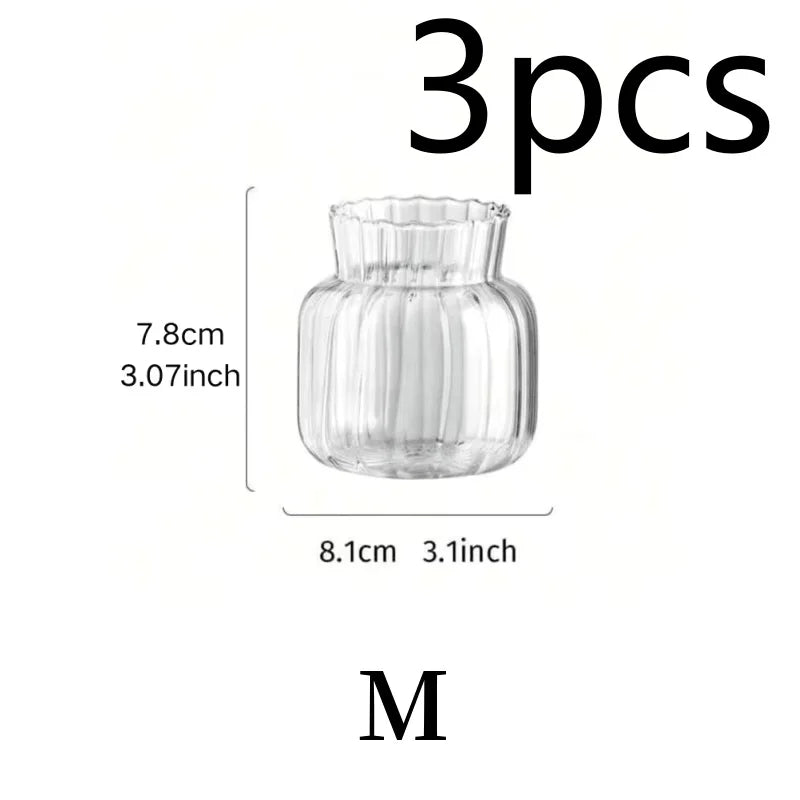 vases transparents modernes rayures verticales poignée métallique décoration intérieure table centrale pièces