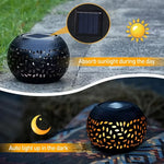 lampe solaire moderne perforations dorées jardin patio extérieur noir éclairage paysager
