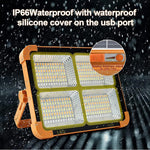 lampe solaire portable orange moderne étanche ip66 poignée articulée panneau solaire usb