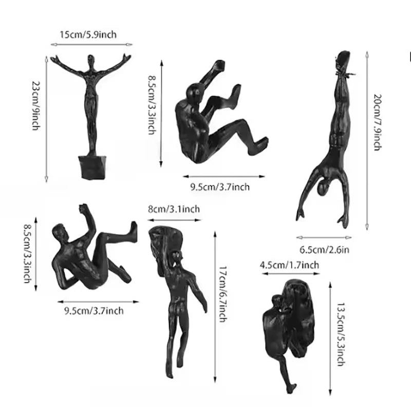 ornements statuettes grimpeurs noir sculptures détaillées art contemporain fixations chaînes socles décoration murale
