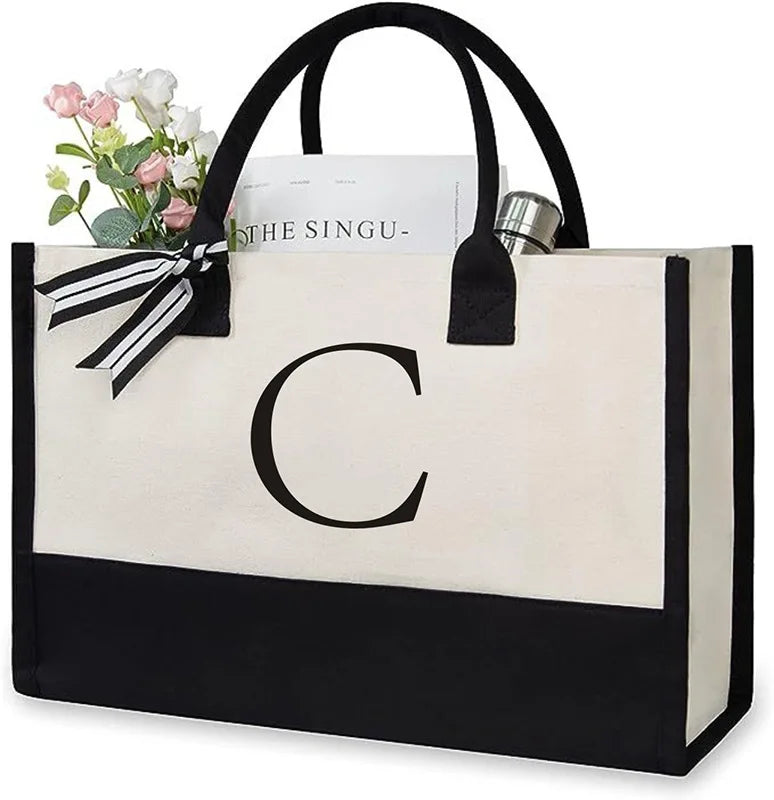 sac main toile lettre imprimée blanc noir rubans classique poignées intérieur noir zippé capacitaire