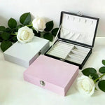 boîte bijoux simili cuir noir blanc rose compartiments cadenas classique organisation sécurité