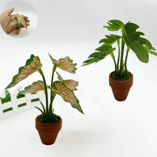 décoration intérieure plante artificielle pot terre cuite feuilles vertes taches jaunes blanc nature réaliste