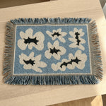 tapis table textile motif tigre étoiles jaune noir bleu clair décoration table manger résistant