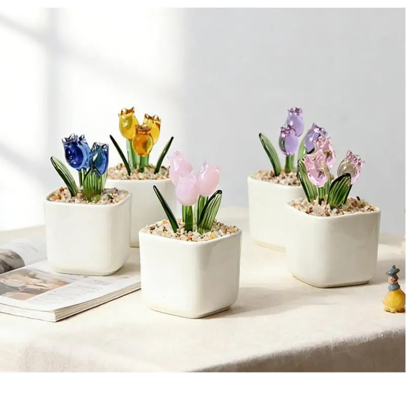 pots fleurs artificielles couleurs variées feuilles vertes pots carrés blancs gravier beige modernes