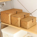 boîtes rangement naturel rustiques tissage paille poignées métalliques stockage maison