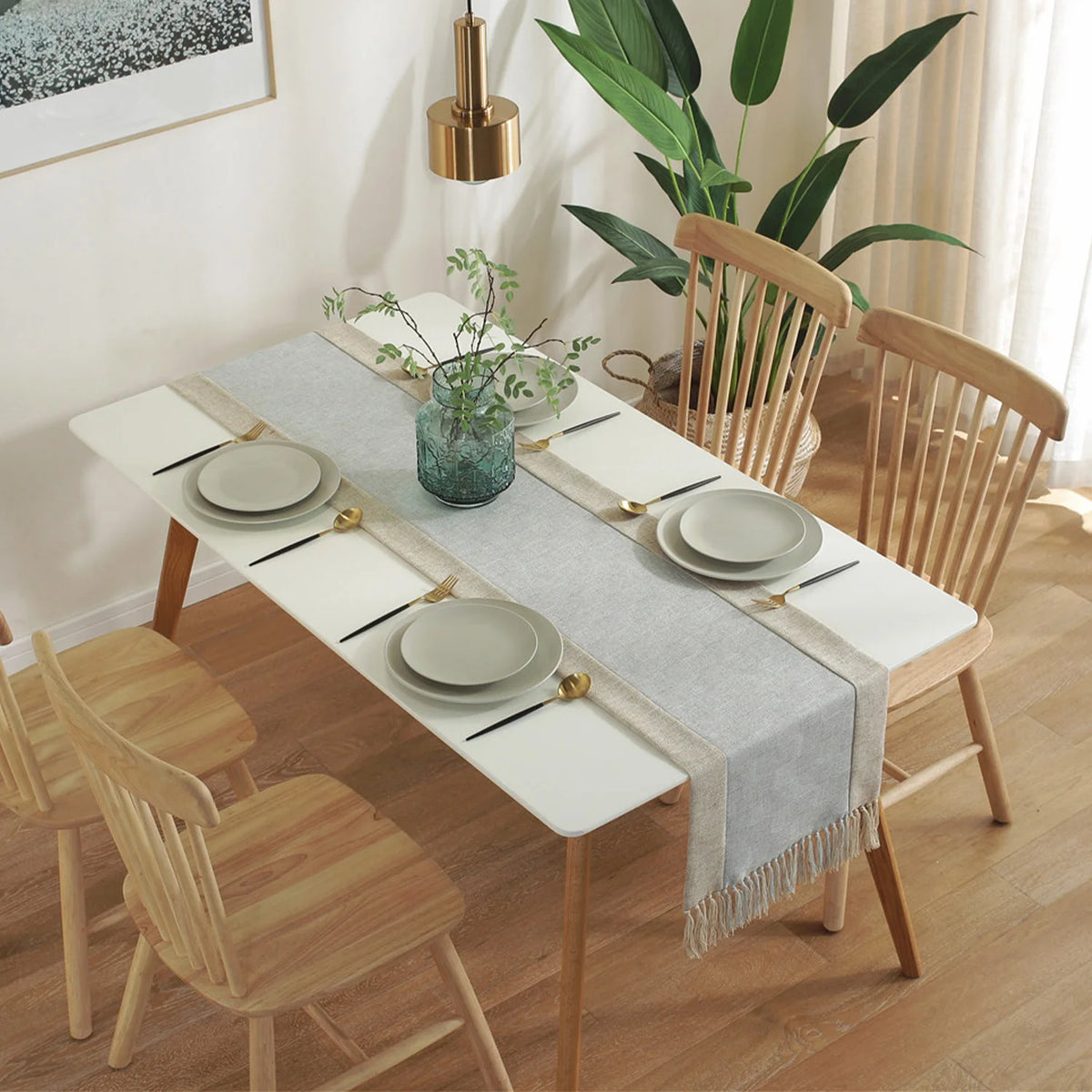 nappe tissée franges scandinave minimaliste gris beige vertebranches verte plante verte pot artwork encadré