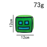 peluche cube dessin animé visage sourire couleur rouge jaune vert rose bleu noir