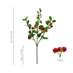 décoration intérieure bouquets branches baies rouges feuilles vertes artificielles naturelles occasion fête maison
