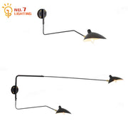 lampe murale mid century noir doré réglable orientation lumière jaune
