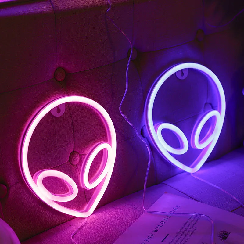 Installation de l'enseigne LED sur un mur de salle de jeux