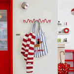 porte sacs mural rouge spirale moderne fixations vis sacs accessoires robuste métal
