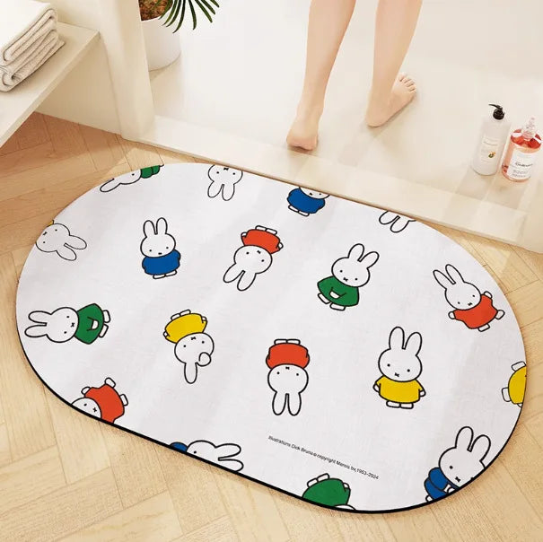 tapis bain dessin animé lapins gris jaune vert bleu rayures enfantin absorbant