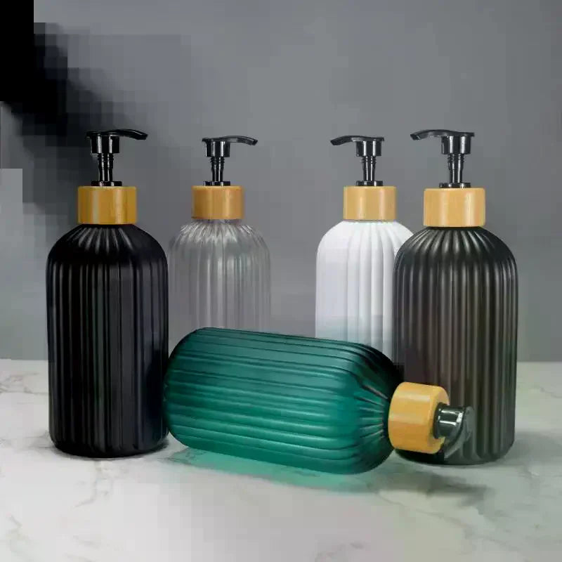 flacon savon liquide moderne rayures vertes pompe pression bouchons dorés vert noir blanc