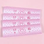 étiquettes autocollantes bouteilles d'eau transparentes motif ballons roses rubans happy birthday points dorés festif