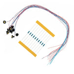 composants électroniques résistances bleues connecteurs câbles adhésifs noir bleu rouge jaune
