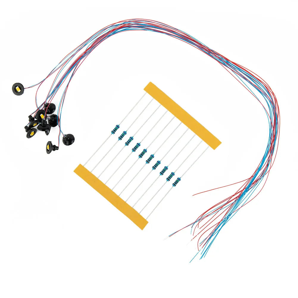 composants électroniques résistances bleues connecteurs câbles adhésifs noir bleu rouge jaune