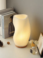 lampe table moderne blanc rayures verticales opacité base plate câble électrique chambre étude