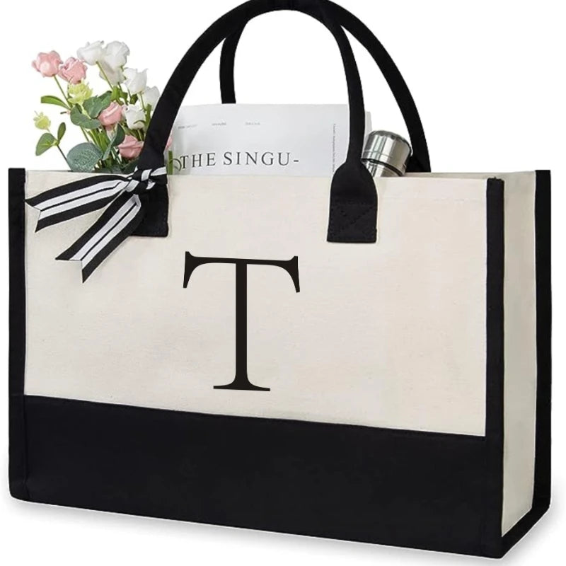 sac main toile lettre imprimée blanc noir rubans classique poignées intérieur noir zippé capacitaire