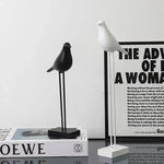 statues oiseaux noir blanc minimaliste sculpture deco intérieur base plate pieds minces