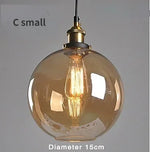 suspension lumineuse industrielle vintage ampoule filament verre transparent noir salon restaurant bar