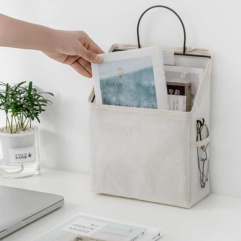 sac rangement mural toile coton beige gris minimaliste poches clips adhésifs poignées métalliques modernes