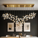 suspension lumineuse moderne élégante dorée feuilles stylisées transparente 120cm 170cm 200cm lumière chaude 3000k