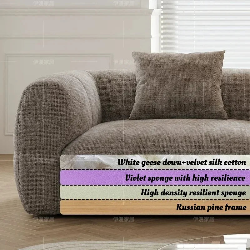 canapé moderne gris tissu uni coussins petite grande pièce minimaliste