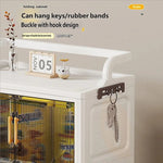 meuble rangement pliable blanc roulettes portes poignées dorées vêtements
