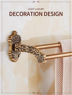 accessoires salle bain doré ornements sculptés finition brillante antique élégant porte serviettes savon toilette