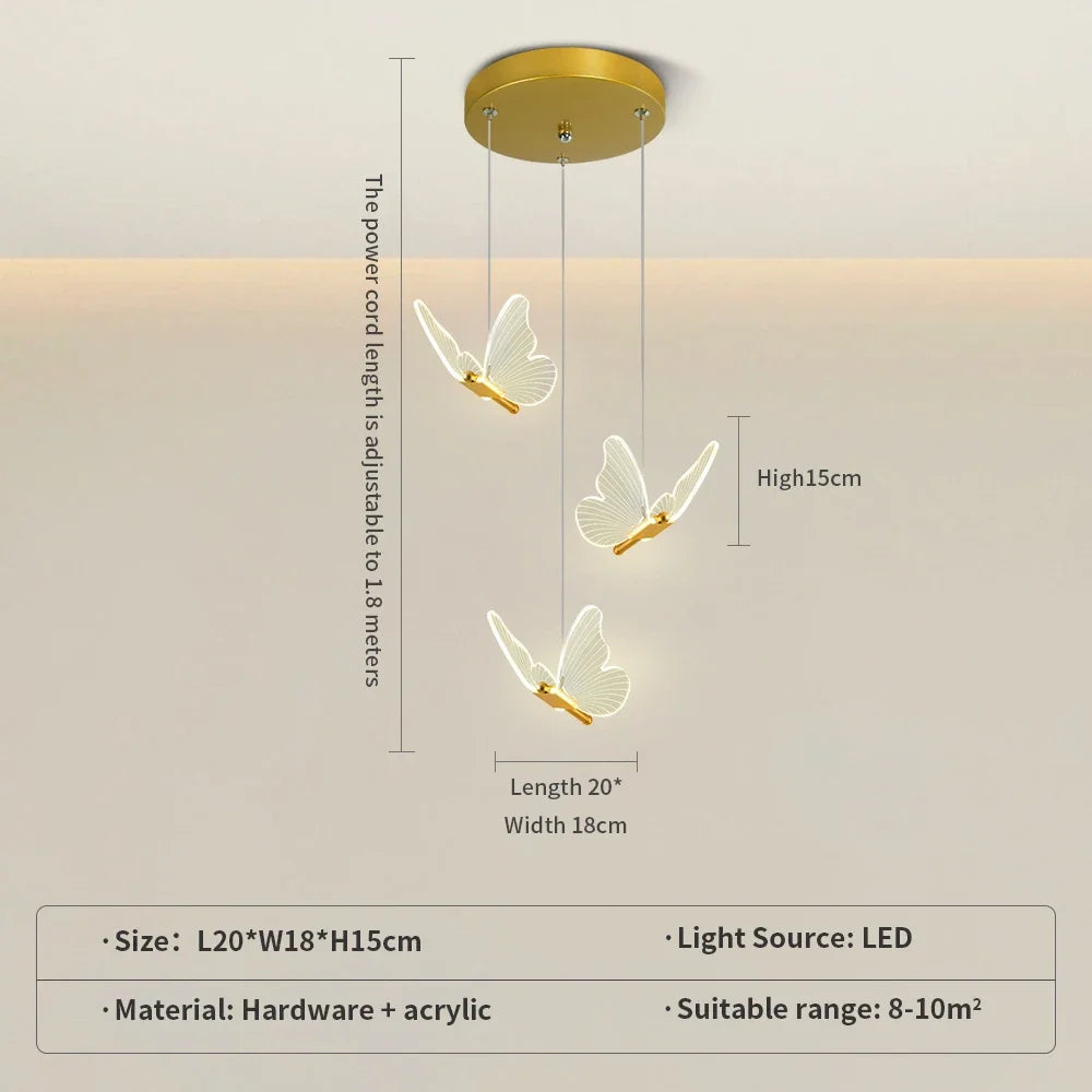 suspension lumineuse moderne or papillons effet lumineux diffus trois têtes